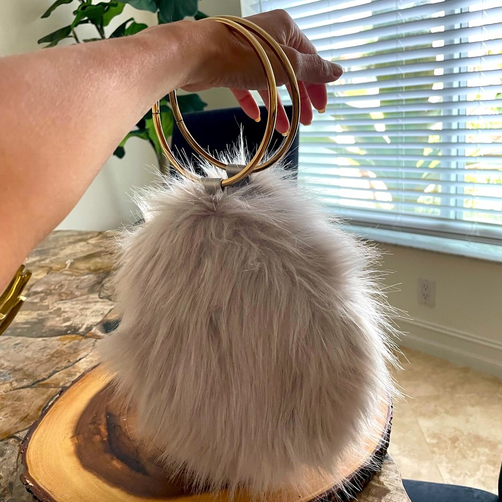 Gray furry clutch